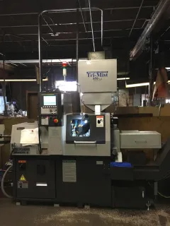 Front view of a Tsugami Lathe